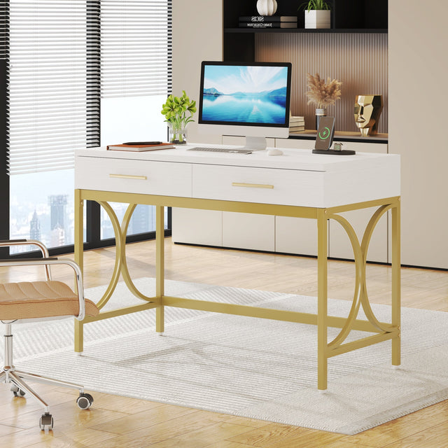 Gold X-frame detail on white desk
